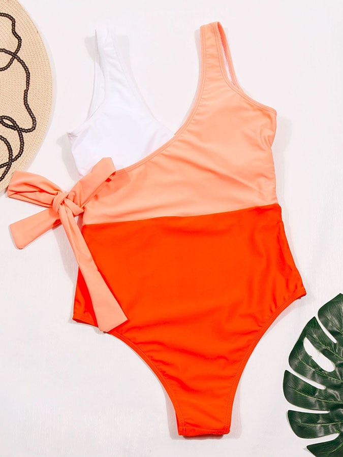 Knitted one-piece multi-panel color swimsuit with waistband and bikini